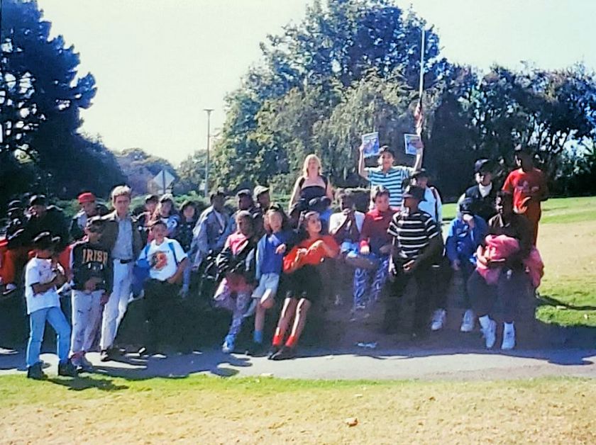 Photo of a group of students in a park.